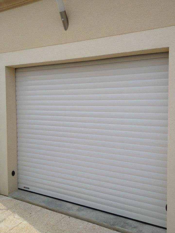 Porte garage enroulable pose chantier installation professionnelle
