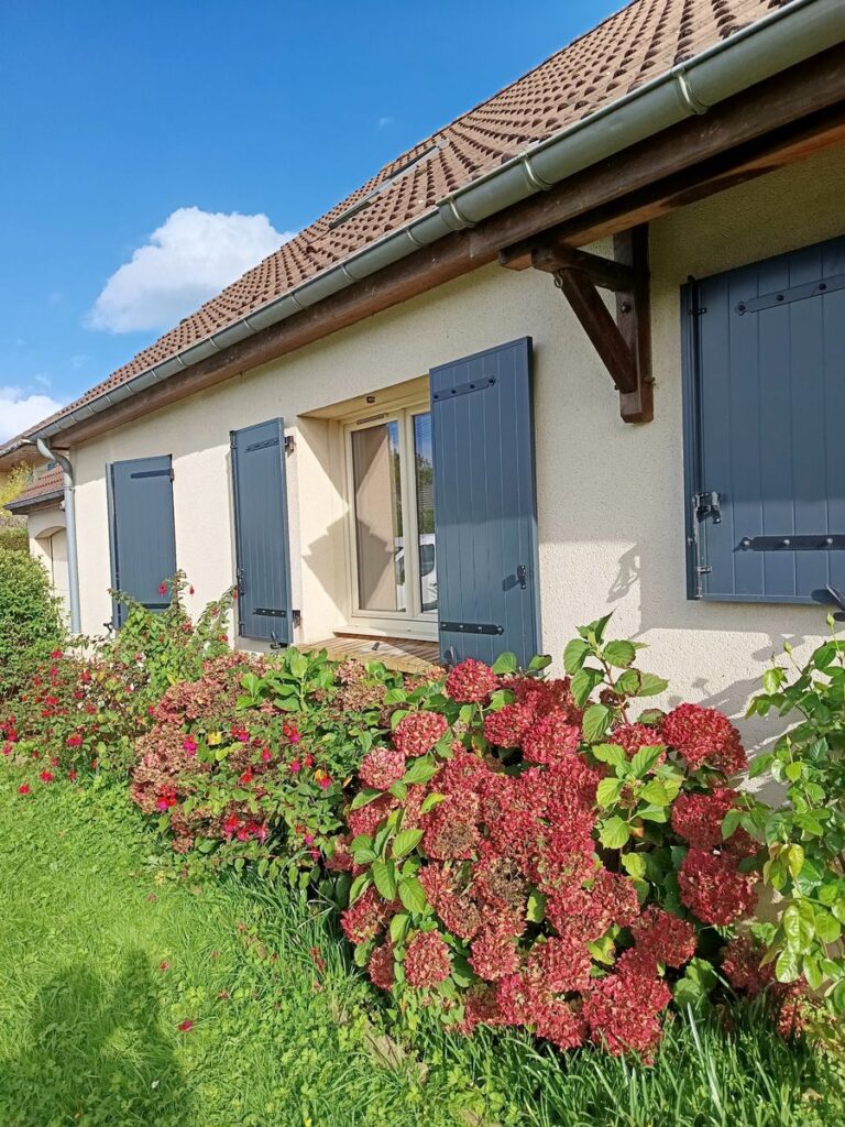 Volets battants aluminium noir sur mesure — photo de réalisation client n°11